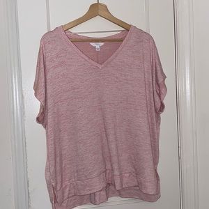 Pink T-shirt. Pretty spacious for a Large.